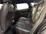 the back seats of a car are empty and the passenger seat is empty