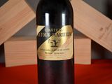 a bottle of wine that is sitting on a table