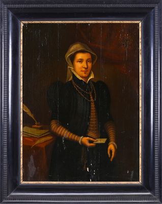 portrait of a man in a black coat and hat holding a book