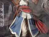 assassins creed figurine action figure in a box with a sword