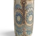 a vase that has a blue and white design on it