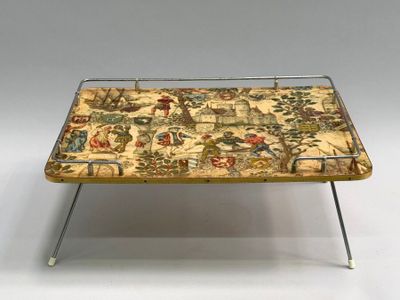 a small tray with a pattern on it on a table