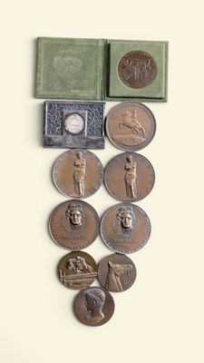 a lot of coins that are sitting on a table