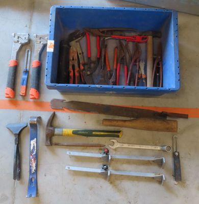 many tools that are laying out on the floor