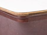 a close up view of a wooden table with a white top
