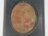 a picture of a picture of a clock hanging on a wall