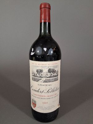 a bottle of wine that is sitting on a table