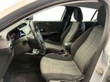 the interior of a car with the front seats folded down