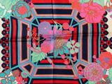an image of a square scarf with flowers and butterflies on it