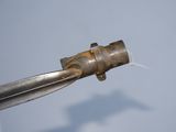 a close up of a pair of scissors cutting a piece of metal