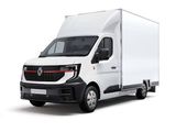 Une camionnette blanche est garée sur une surface blanche.