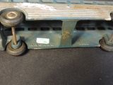 a close up of a skateboard with wheels on it