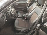 the interior of a car with black leather seats and black trims
