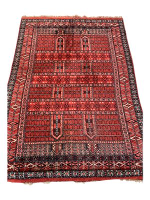 un tapis rouge et noir sur fond blanc