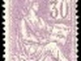 un timbre sur lequel figure l'image d'une femme et d'un enfant