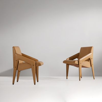 paire de fauteuils de salon de style « mid-century modern », dans la veine de Charles Eames