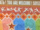 a sign on the wall that says welcome souvene