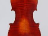 an old violin with a wooden back and a long neck
