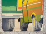 a picture of a truck painted on the side of a building