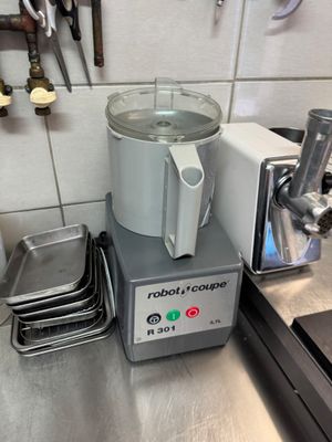 a blender that is sitting on a counter in a kitchen
