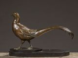 a bronze sculpture of a pheasant on a marble base