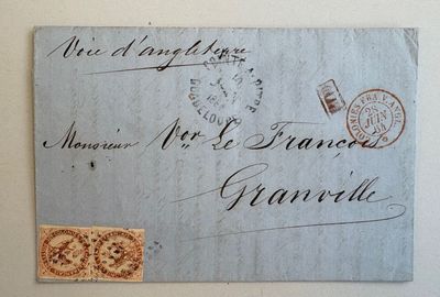 un gros plan d'un morceau de papier sur lequel est apposé un timbre