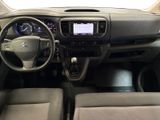 the interior of a car with a steering wheel, dashboard, and dash board