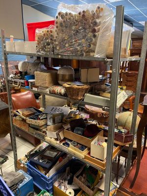 a shelf full of assorted items in a room