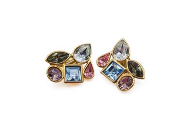 a pair of multicolored earrings on a white background
