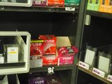 many boxes of tissues on the shelves in the store