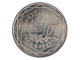 une vieille pièce en euros sur fond blanc, portant l'inscription « euro »