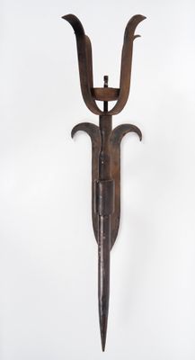 an image of a wall sconce with a knife on it