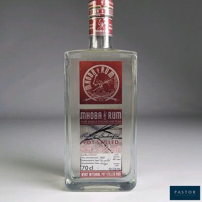 a bottle of alcohol that is sitting on a table