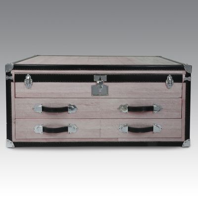 an image of a chest of drawers on a grey background