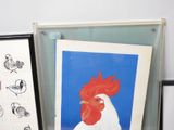 a picture of a rooster in a frame next to a picture of a bird