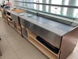 a counter with a glass top in a restaurant