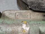 a close up of a piece of metal on the ground