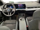a picture of the interior of a car with a touch screen