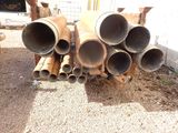 a pile of pipes that are stacked on top of each other