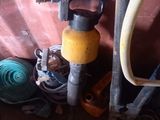 a hose that is attached to a wall next to a hose