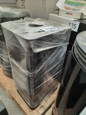 a stack of microwaves wrapped in plastic on a pallet