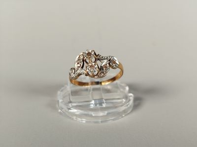 an image of a diamond ring on a clear surface