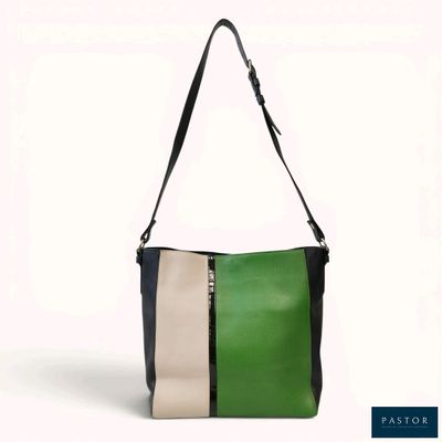 an image of a green and white purse with a black strap