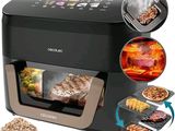 une photo d'une friteuse-four noir et argent contenant des aliments