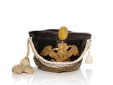 an image of a hat with a gold eagle on it