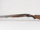 a rifle with a wooden barrel and a metal muzzle on a white background