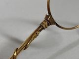 a close up of a magnifying glass on a white surface