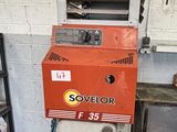 a machine that is sitting inside of a building