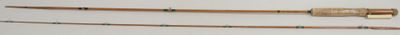 two different types of knitting needles on a white surface