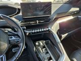 a picture of a car dashboard with a laptop on it